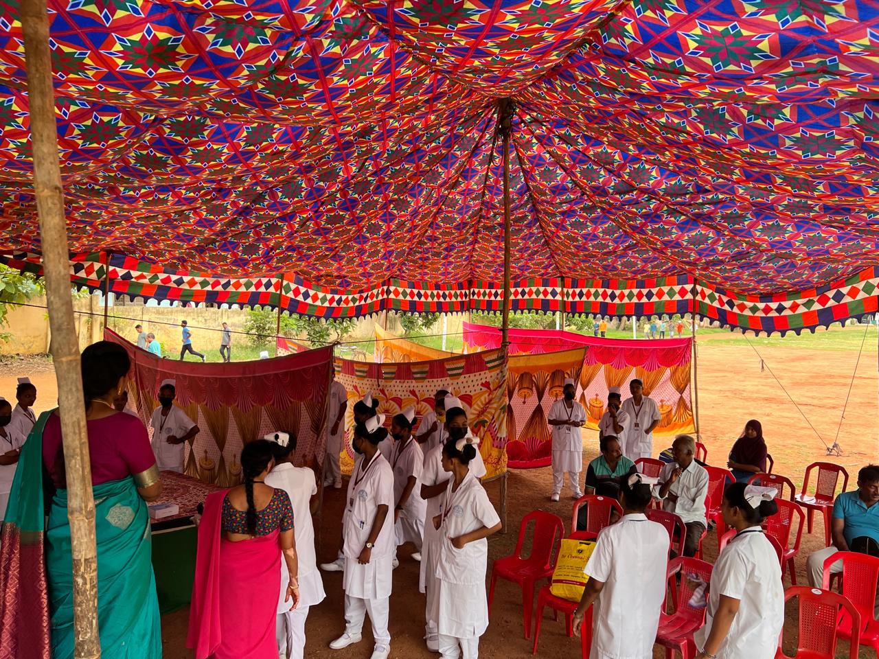 Nursing team supporting an outdoor community health camp